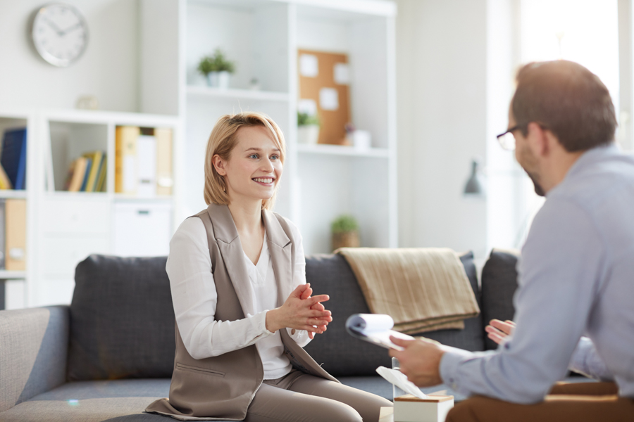 Woman smiling during her cognitive behavioral therapy for addiction in Clovis, CA