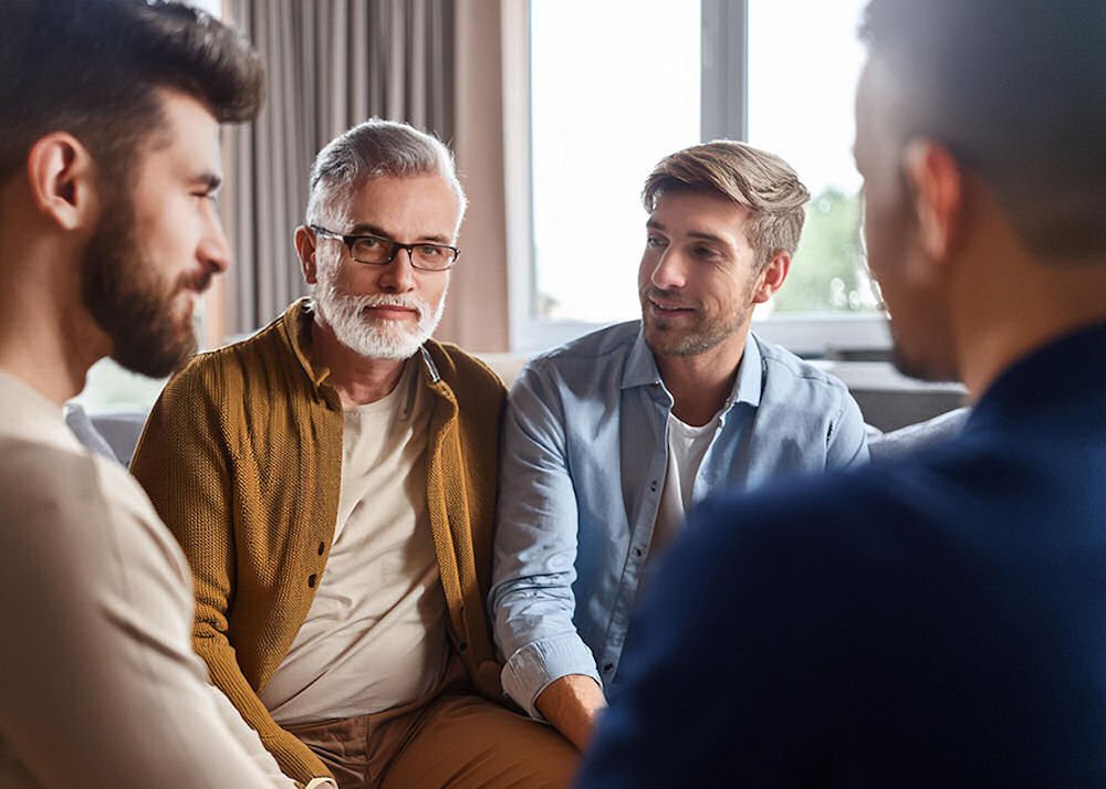 Group of male relatives acting as support system in addiction