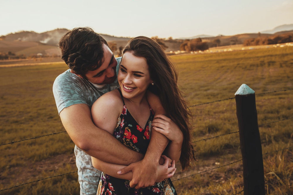 Man embraces woman lovingly after achieving sobriety