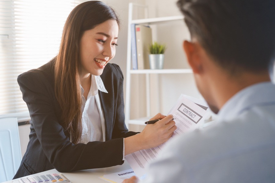 Woman outlining treatment options for high-functioning depression to man