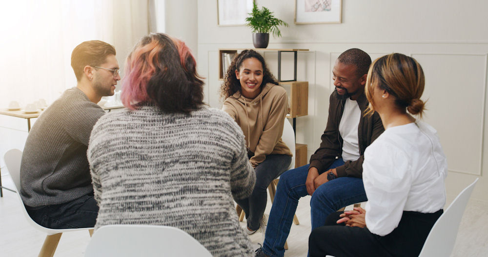 support group of younger people discussing being a functional alcoholic