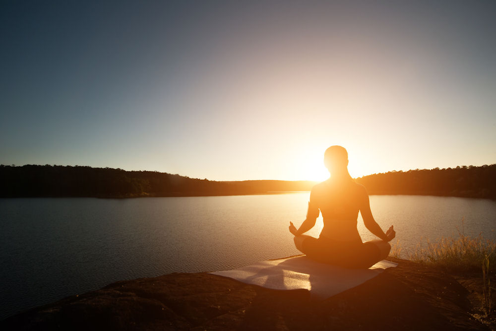 Individual practicing outdoor mindfulness to strengthen emotional regulation during recovery