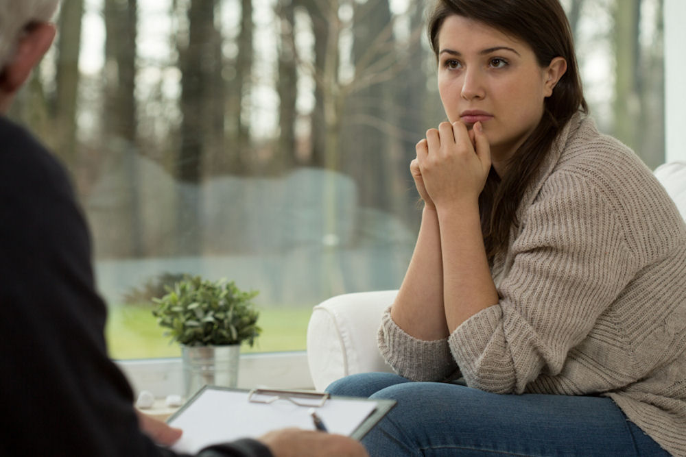 women discussing IOP options in during therapy