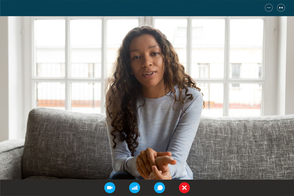 virtual IOP client meeting with a therapist by video